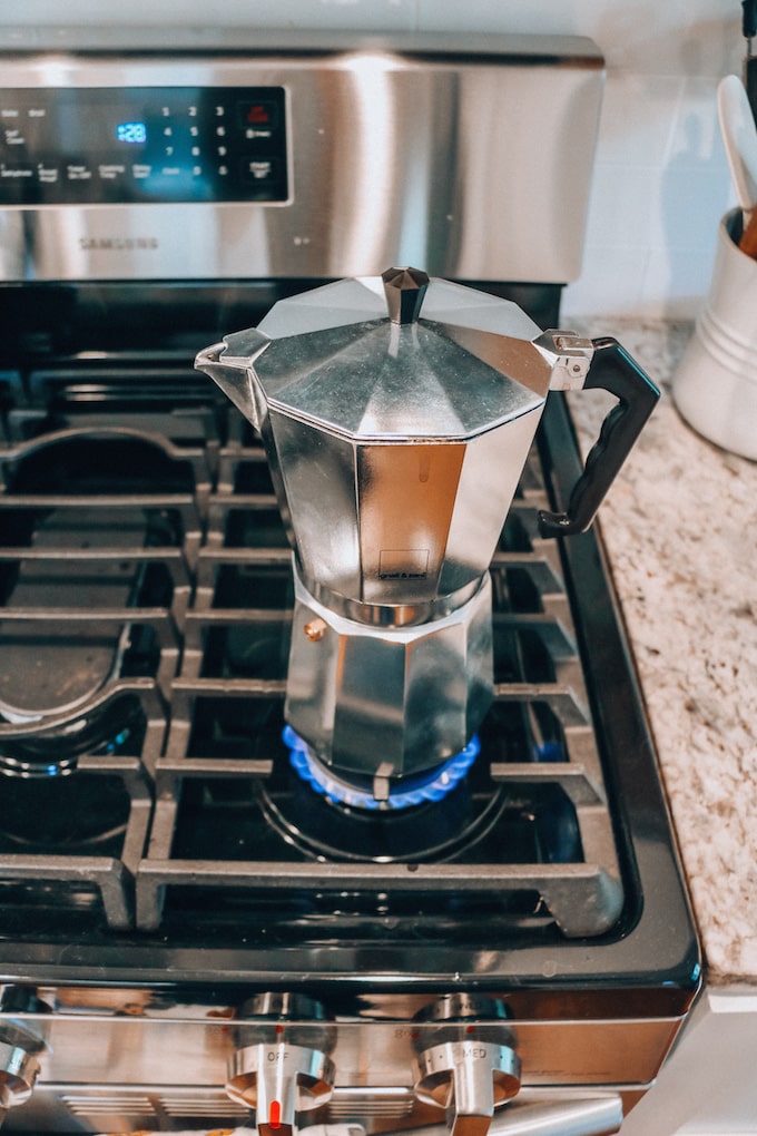 I used my Moka pot on an induction stove using a pot with some water in it.  After the brew, the bottom half of my Moka pot that was touching the hot