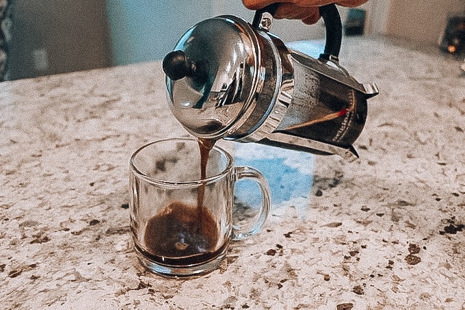 pouring coffee with french press