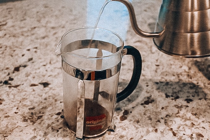 pouring water into french press